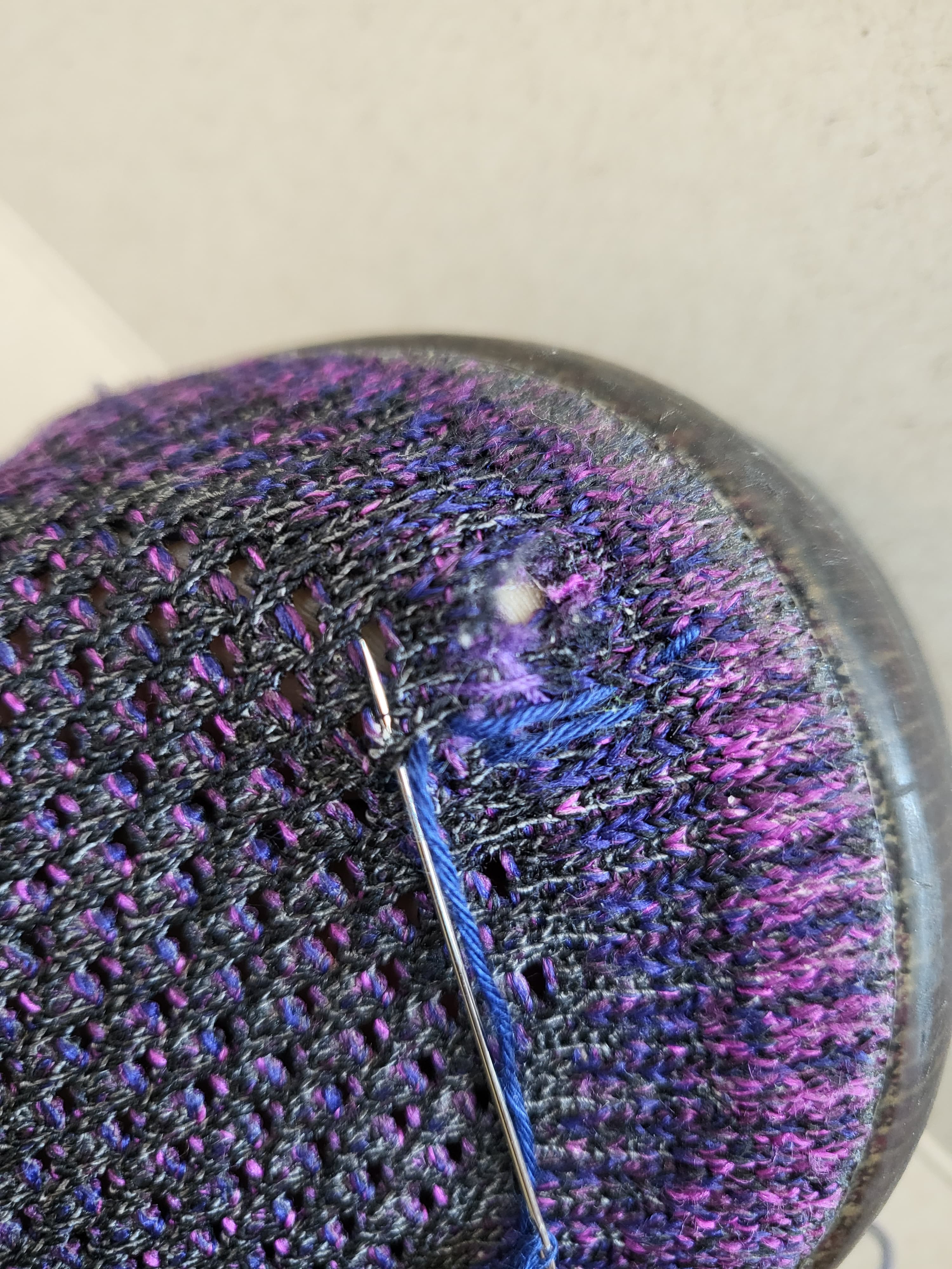 Nike Vapormax toe — needle and blue thread mid-darning