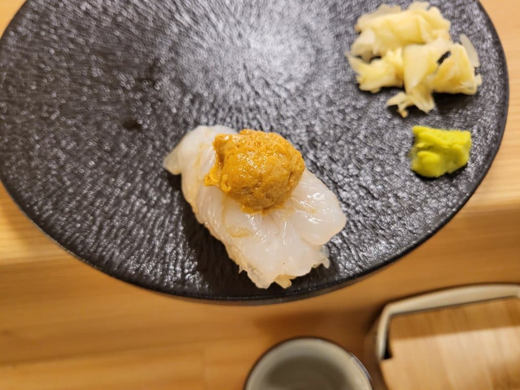 Shrimp nigiri topped with ankimo