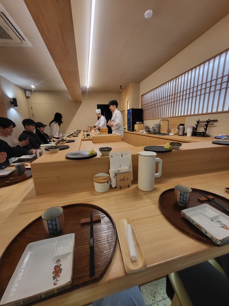 Sushi Ichi counter — the omakase bar where chef and guests face each other