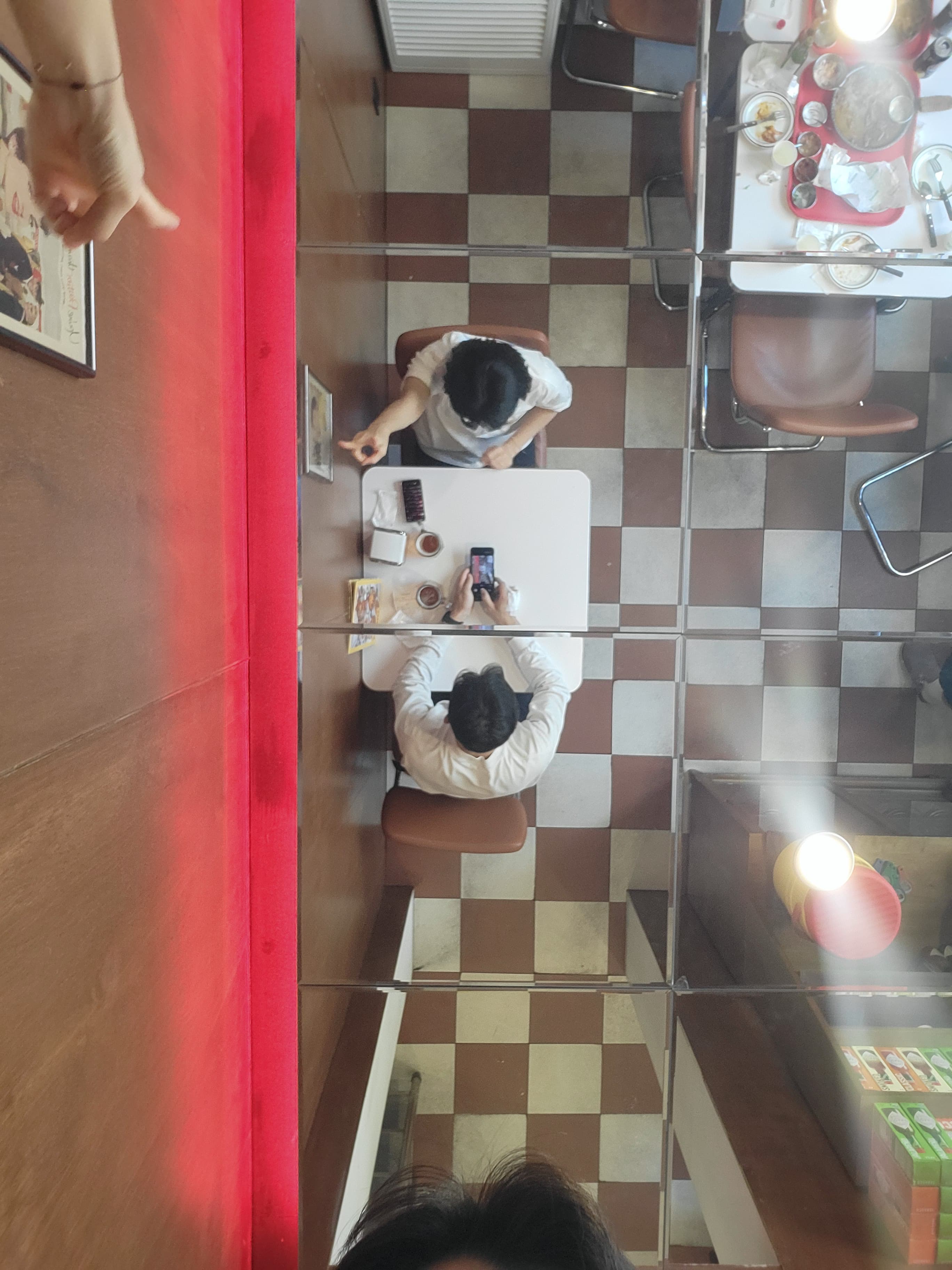 Tacodot — mirror ceiling reflection of the dining room